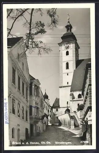 AK Grein a. d. Donau /Strudengau, Strassenpartie mit Kirche