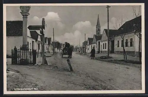 AK Unterpullendorf, Ortspartie mit Säule und Pferdefuhrwerk