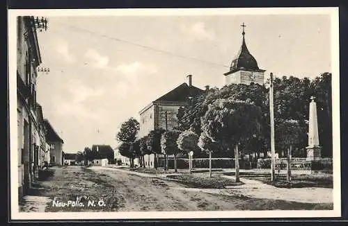 AK Pölla /N.-Oe., Neu-Pölla, Strassenpartie mit Kirche, Denkmal und Häusern