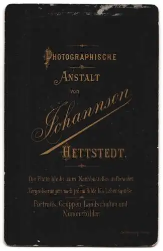 Fotografie Johannson, Hettstedt, zwei niedliche Kinder am Fell, im Passepartout