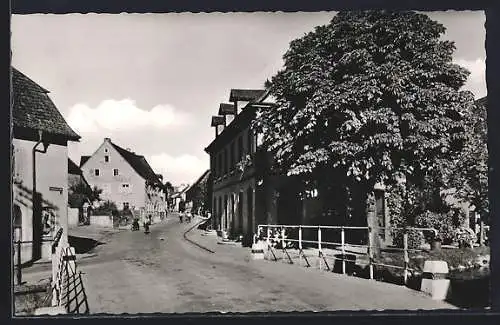 AK Heitersheim, Hauptstrasse von einer Brücke aus