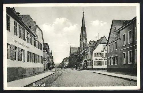 AK Neuwied, Hotel zum wilden Mann mit Strassenpartie