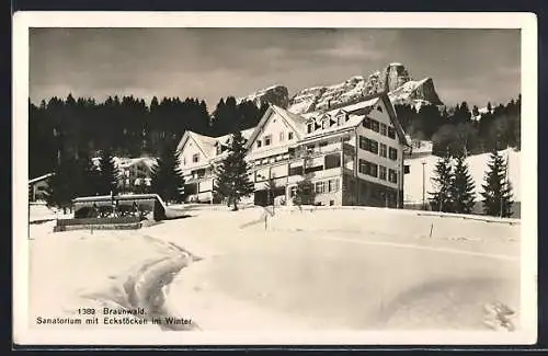 AK Braunwald, Sanatorium mit Eckstöcken im Winter