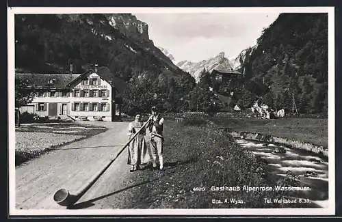 AK Wasserauen, Mann mit Alphorn vor dem Gasthaus Alpenrose