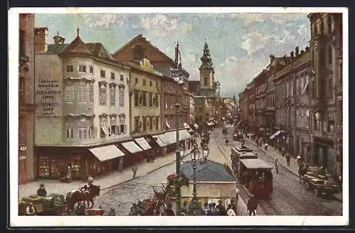 AK Linz a. d. Donau, Landstrasse mit Strassenbahn