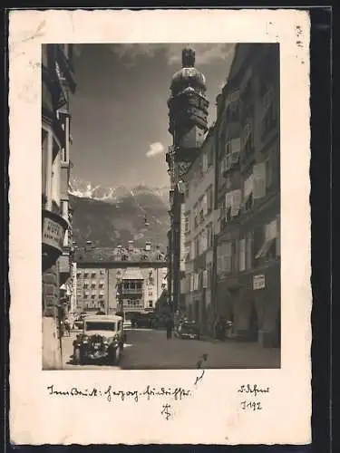 Foto-AK Adalbert Defner: Innsbruck, Strassenansicht mit Autos