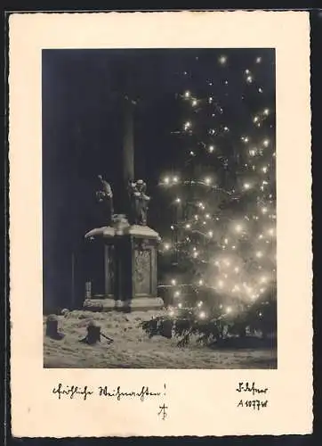 Foto-AK Adalbert Defner: Fröhliche Weihnachten, Geschmückter Tannenbaum im Schnee