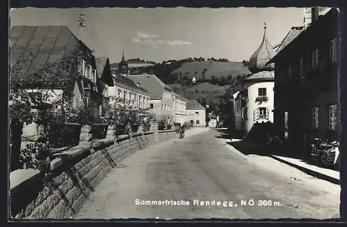 AK Randegg /N. Ö., Strassenpartie mit Eisenwarenhandlung Engelbert Pruckner
