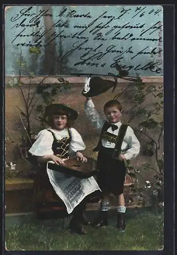 AK Kleines Trachtenpaar mit Zither