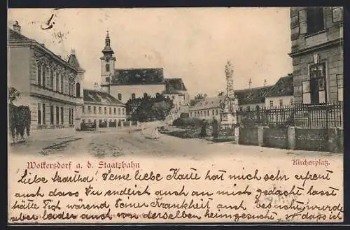 AK Wolkersdorf a. d. Staatsbahn, Kirchenplatz mit Kirche und Denkmal