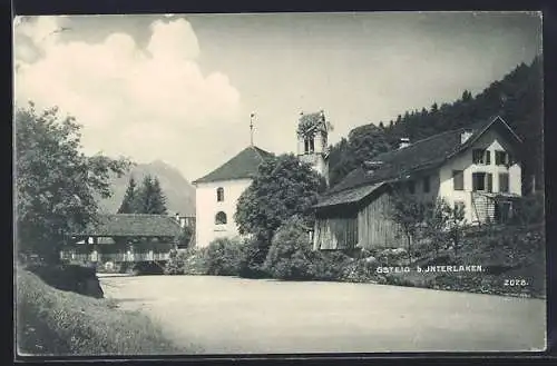 AK Gsteig /Interlaken, Ortspartie mit Kirche und überdachter Strassenbrücke
