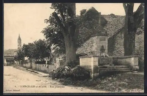 AK Courcelles-sur-Aujon, Rue principale et monument en pierre