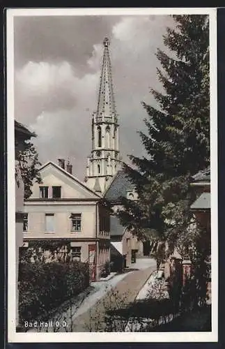 AK Bad Hall, Strassenpartie mit Blick zum Kirchturm