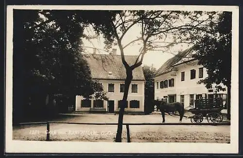 AK Kircham /O.-Oe., Ortspartie mit Pferdewagen