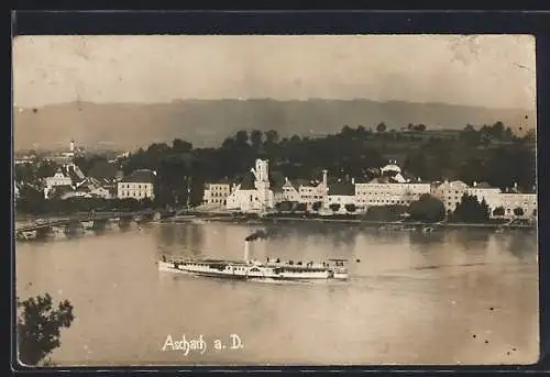 AK Aschach a. D., Ortsansicht über die Donau mit Dampfer