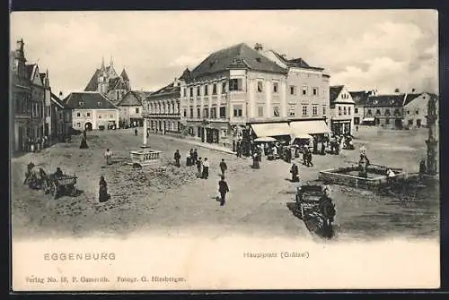 AK Eggenburg, Hauptplatz (Grätzel) mit Brunnen, Säulendenkmal und Kirchenblick