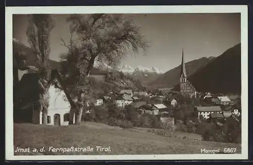 AK Imst a. d. Fernpassstrasse, Ortsansicht an einem strahlenden Frühlingstag