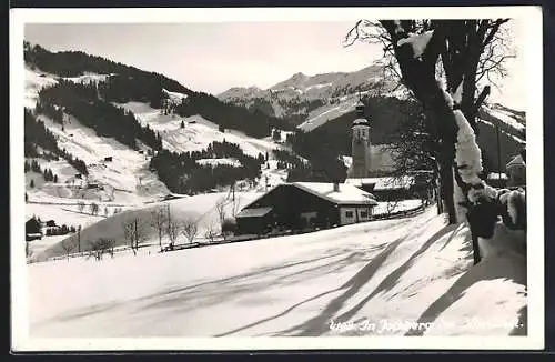 AK Jochberg bei Kitzbühel, Ortspartie mit Kirche im Winter