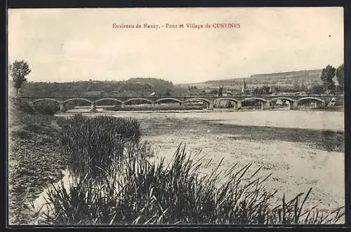 AK Custines, Pont et village au bord de la rivière