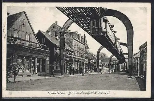 AK Elberfeld, Schwebebahn Barmen-Elberfeld-Vohwinkel über der Strasse