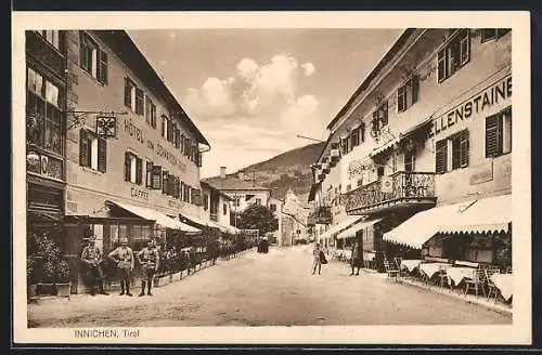 AK Innichen, Hotel Zum Schwarzen Adler, Strassenpartie