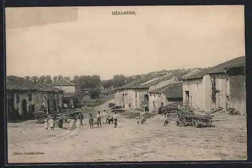 AK Hénaménil, Vue sur la rue principale avec villageois et charrettes