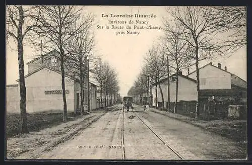 AK Nancy, Sur la Route du Pont-d`Essey, vue des environs avec charrette et arbres alignés