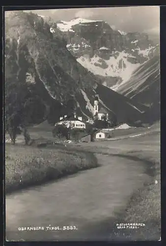 AK Obernberg /Tirol, Ortsansicht gegen das Gebirge