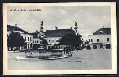 AK Bruck /Leitha, Hauptplatz mit Brunnen