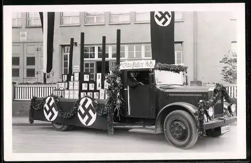 Fotografie unbekannter Fotograf, Ansicht Kirchheim / Teck, Otto Ficker AG, MAN LKW mit  Propagand Werbung