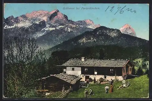 AK Partenkirchen, Gasthaus Eckbauer mit abendroten Bergen