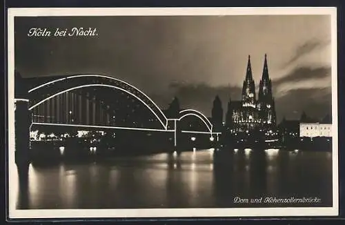 AK Köln, Dom und Hohenzollernbrücke bei Nacht