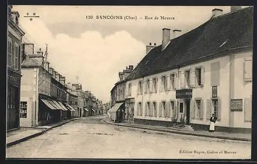 AK Sancoins, Rue de Nevers avec bâtiments et commerces