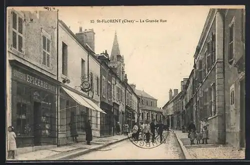 AK Saint-Florent, La Grande Rue animée avec des passants et des commerces