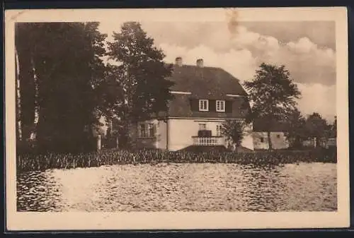 AK Mittelhausen /Liebenwerder, Uferpartie mit Hotel Seehof