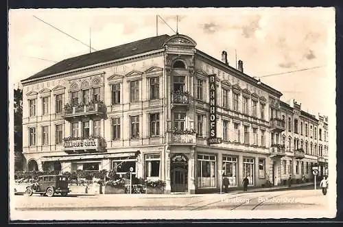 AK Flensburg, Bahnhofs-Hotel C. Prien mit Strasse