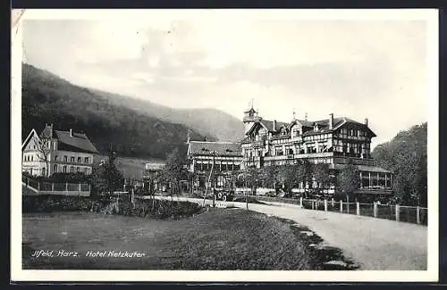 AK Ilfeld /Harz, Hotel Netzkater mit Strassenpartie