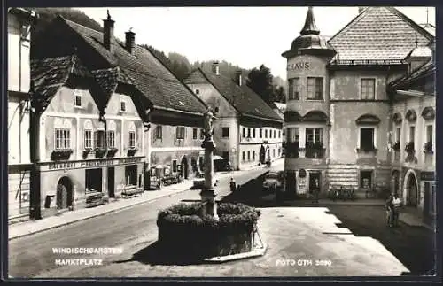 AK Windischgarsten, Marktplatz mit Bäckerei Fam. Bruckmüller und Brunnen