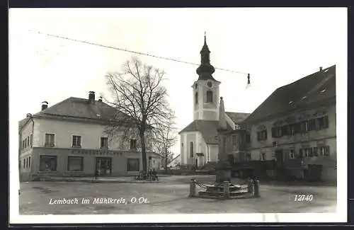 AK Lembach im Mühlkreis, Strassenpartie mit Geschäft von A. Purchenfelner und Kirche