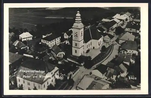 AK St. Peter am Wimberg, Strassenpartie mit Kirche, Fliegeraufnahme