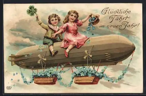 AK Mädchen und Junge mit Kleeblatt sitzt auf einem Zeppelin