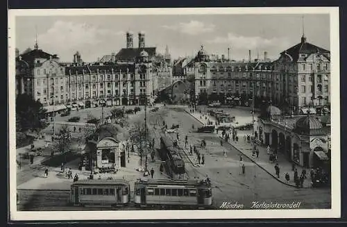 AK München, Karlsplatzrondell mit Strassenbahn und Geschäften