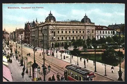 AK Mannheim, Hauptpost mit Planken und vorbeifahrenden Strassenbahnen