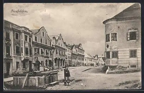 AK Neufelden, Strassenpartie mit Brunnen