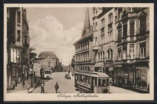 AK Solingen, Mühlenplätzchen, Strassenbahnen passieren das Cafe Höfken