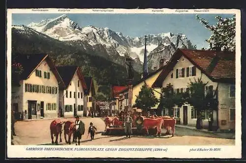 AK Garmsich-Partenkirchen, Floriansplatz gegen Zugspitzgruppe, Zugsppitze, Waxenstein und Alpspitze