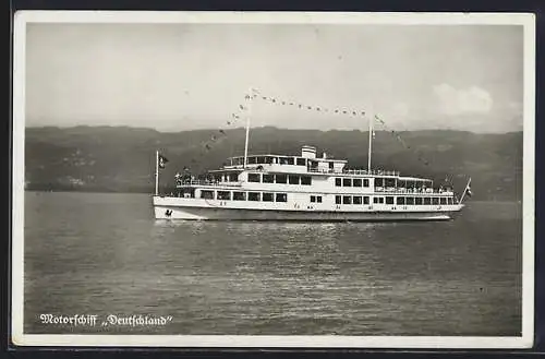 AK Motorschiff Deutschland in Flaggengala auf dem Bodensee