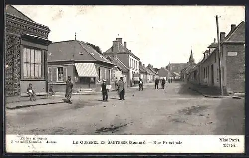 AK Le Quesnel en Santerre, Rue Principale avec habitants en scène de rue animée