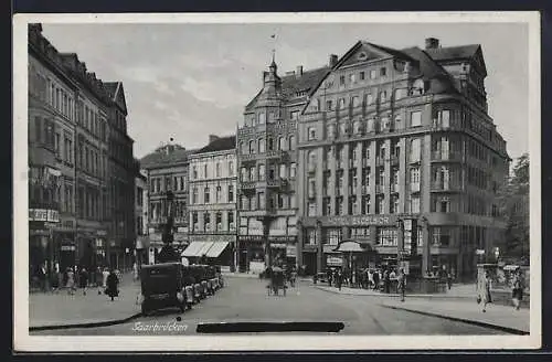AK Saarbrücken, Ecke Reichs- und  Strasse mit Hotel Excelsior und Geschäften