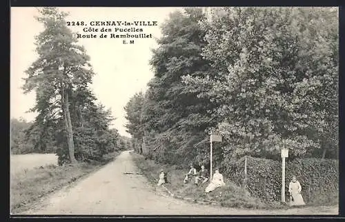 AK Cernay-la-Ville, Côte des Pucelles, Route de Rambouillet avec passants assis